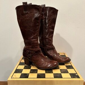 Brown heeled knee high boots